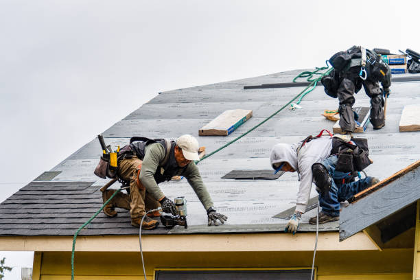 Professional Roofing technician working in Purdys, NY